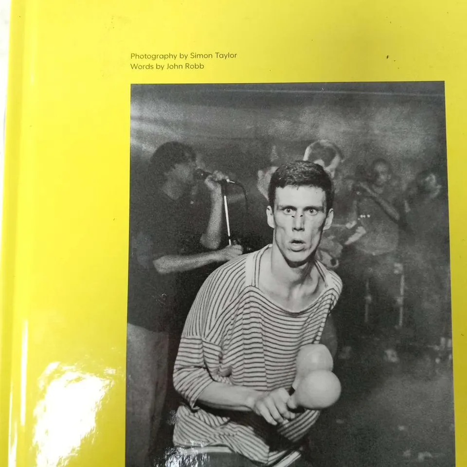 FRAMED MANCHESTER PHOTOGRAPHED 1988-1993 PHOTOGRAPHY BY SIMON TAYLOR WORDS BY JOHN RABB