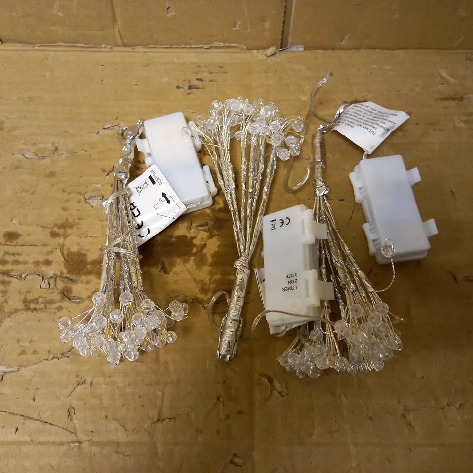 SET OF DESIGNER STARBURST DECORATION - SILVER