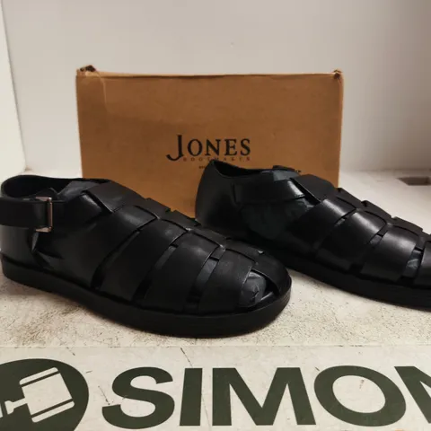 BOXED PAIR OF JONES SANDALS IN BLACK SIZE 9