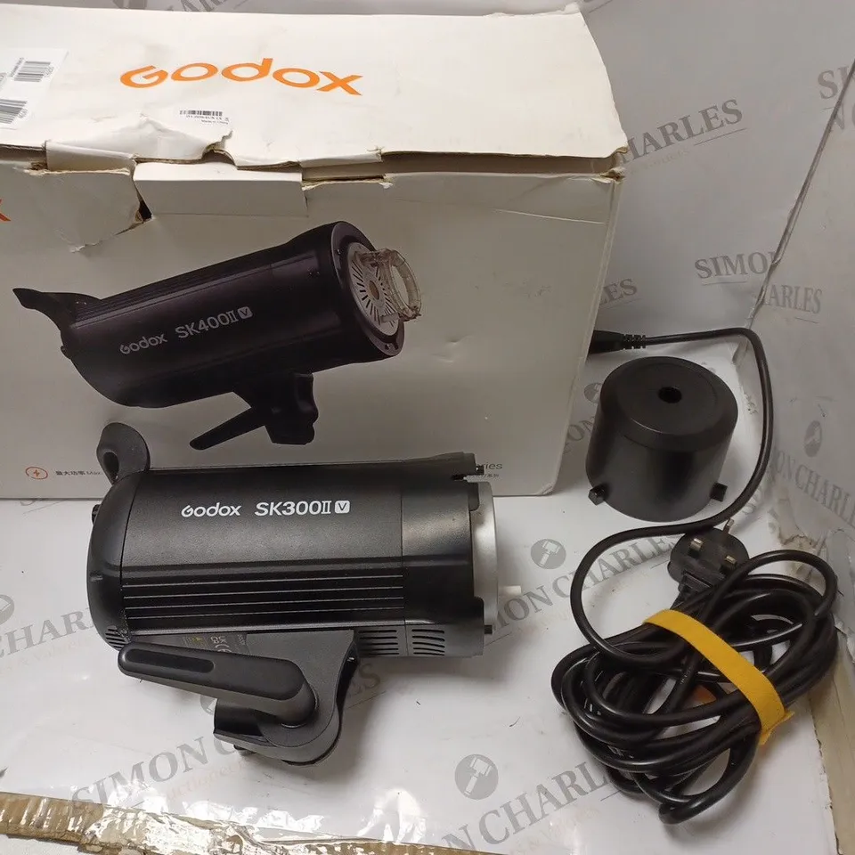 BOXED GODOX SK400II-V STUDIO FLASH LIGHTING WITH LCD DISPLAY. 300 WATTS MAX POWER