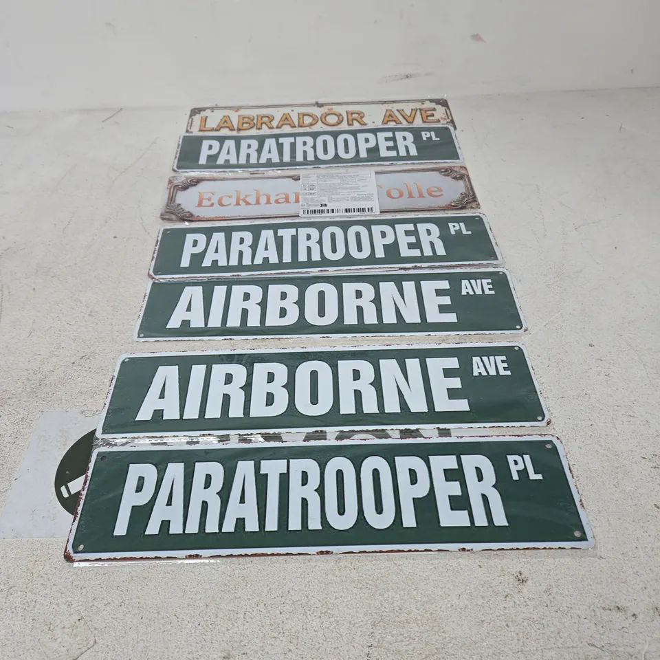 SET OF SIX DECORATIVE METAL STREET SIGNS INCLUDING PARATROOPER PL AND AIRBORNE AVE