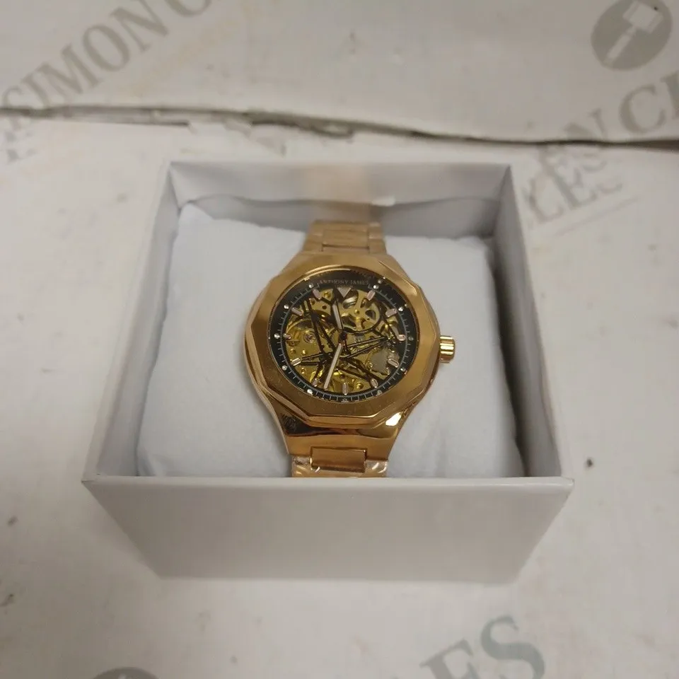 BOXED ANTHONY JAMES GENTS SPORTS SKELETON WATCH WITH STAINLESS STEEL BRACELET. 