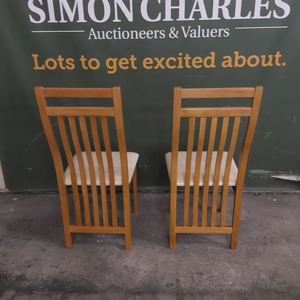 SET OF 2 BALI OAK DINING CHAIRS WITH IVORY SEAT PADS
