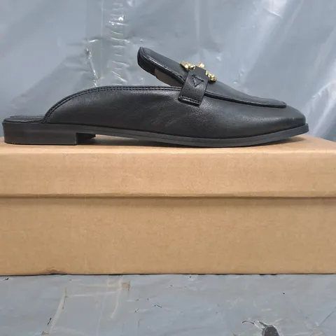 BOXED PAIR OF KAREN MILLEN OPEN BACK ELIP-ON LOAFERS IN BLACK W. GOLD EFFECT DETAIL SIZE 7