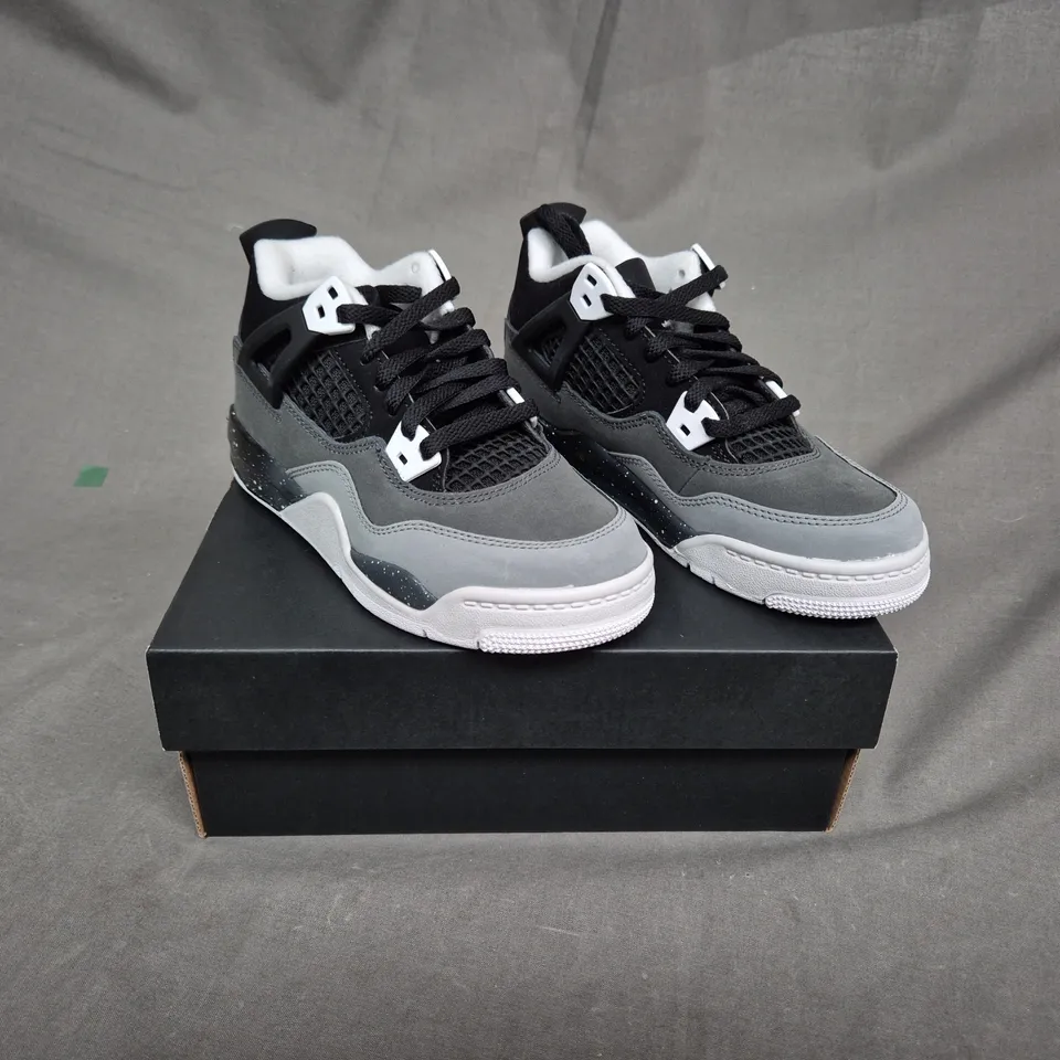 BOXED PAIR OF JORDAN 4 RETRO TRAINERS - UK SIZE 12 - KIDS