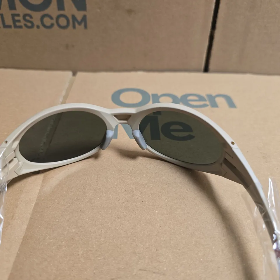 PAIR OF OAKLEY GLASSES WITH BEIGE FRAMES AND CARRY CASE