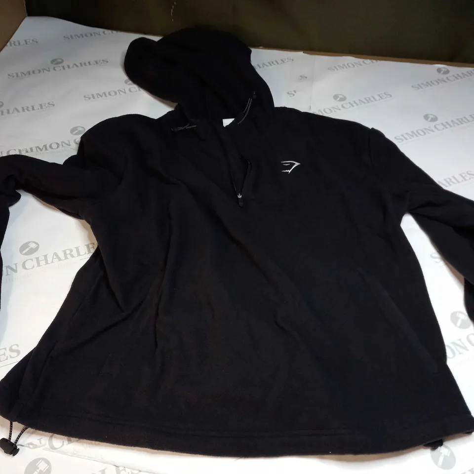 GYMSHARK HALF ZIP LONG SLEEVE HOODED EMBROIDED LOGO FLEECE IN BLACK - MEDIUM