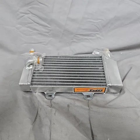 Automotive heat exchanger (intercooler/oil cooler) with mounting brackets