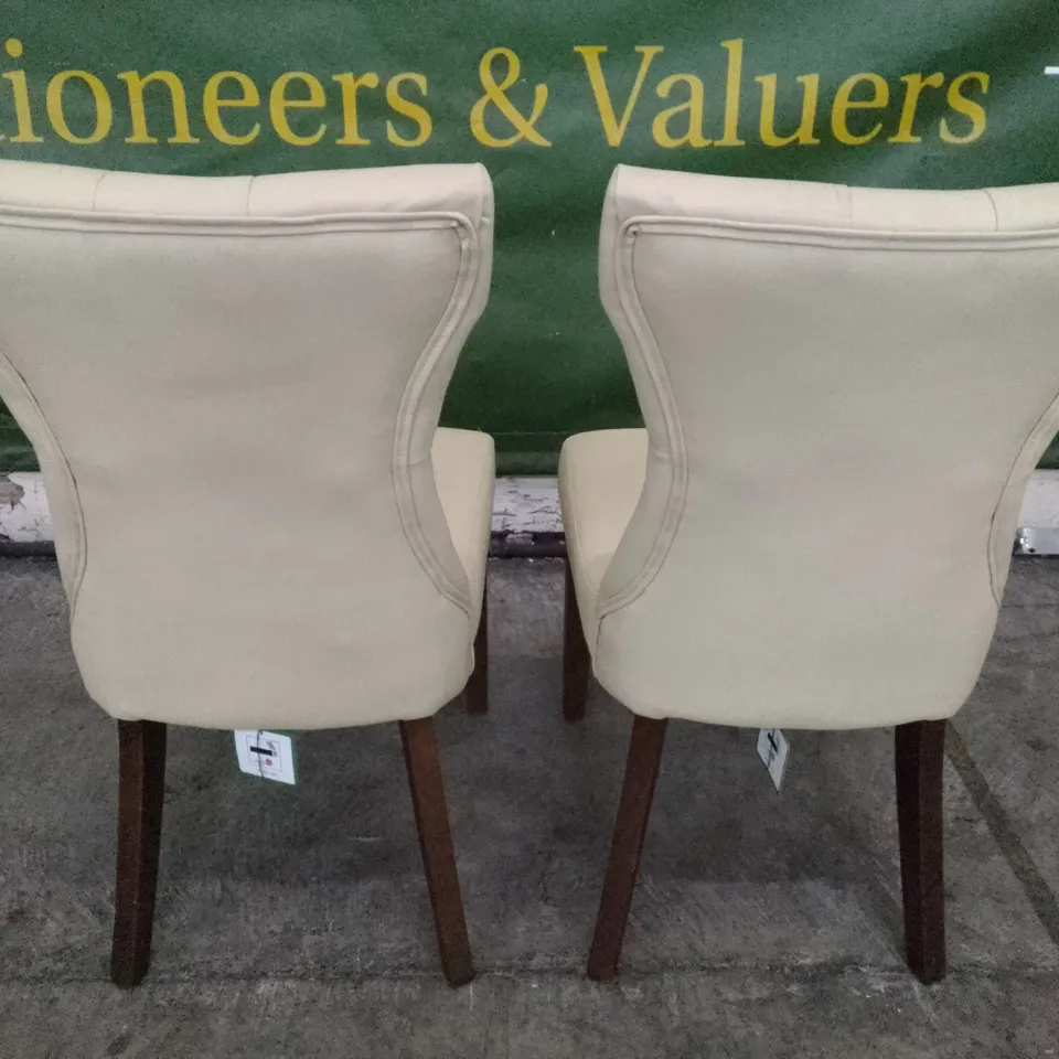SET OF 2 NEW BEWLEY IVORY LEATHER BUTTON BACK DINING CHAIRS (DARK OAK LEG)