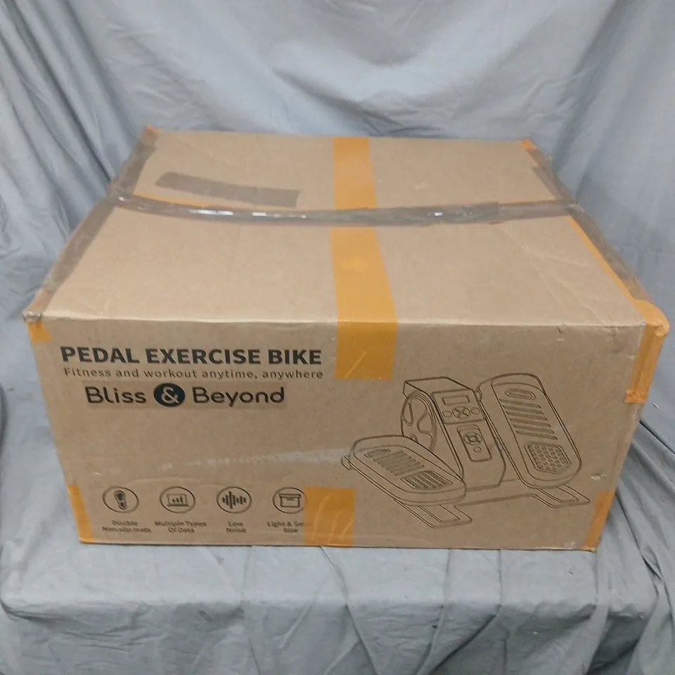 BOXED BLISS & BEYOND PEDAL EXERCISE BIKE