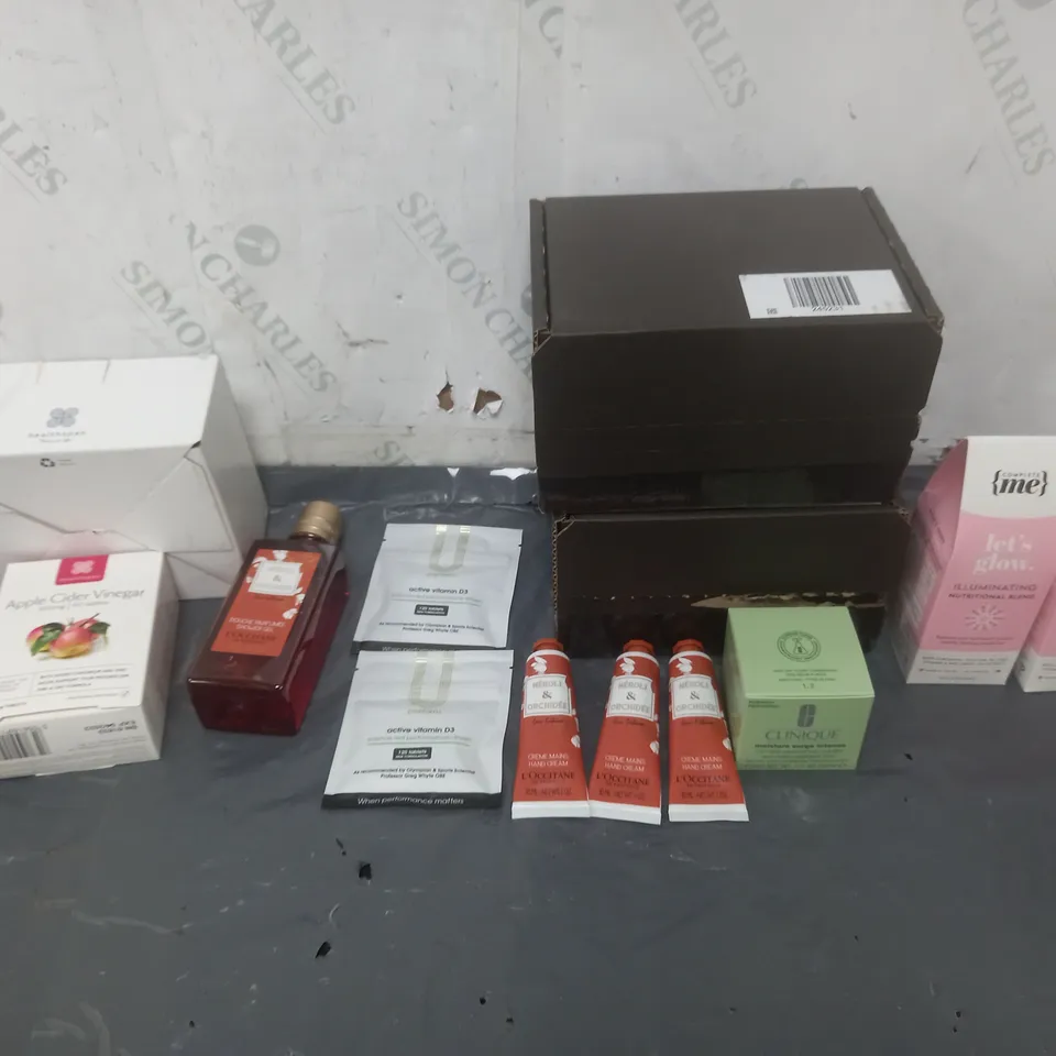 10 ASSORTED COSMETICS TO INCLUDE ACTIVE VITAMIN D3, COMPLETE ME LETS GLOW, AND CLINIQUE MOISTURE SURGE INTENSE ETC.