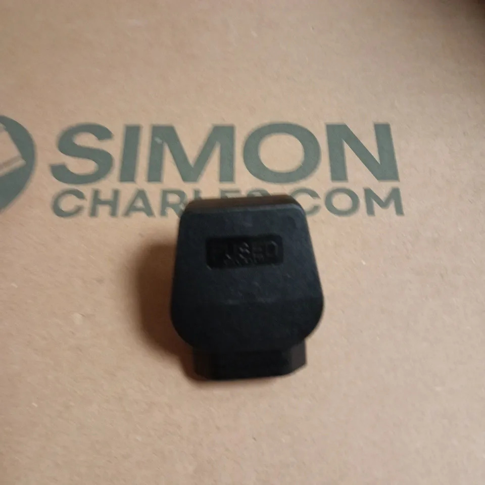 BOX OF APPROXIMATELY 20 BLACK ADAPTER PLUGS 