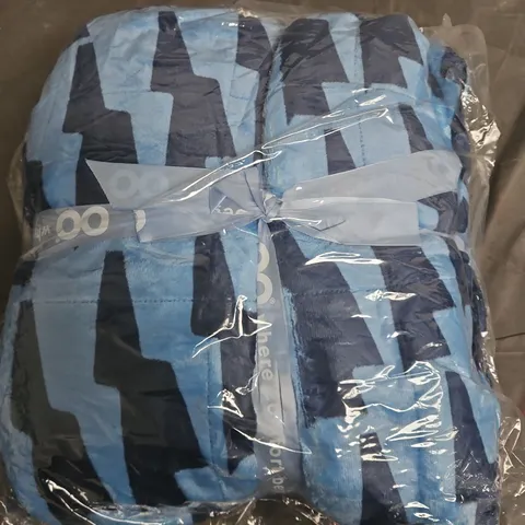 Blue onesie  – folded, wrapped 