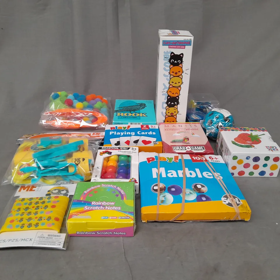 LOT OF ASSORTED TOYS AND GAMES TO INCLUDE PLAYING CARDS, MARBLES AND CRAYOLA