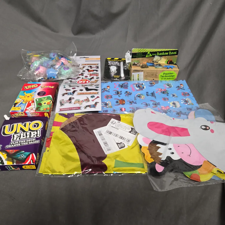 APPROXIMATELY 10 ASSORTED TOYS AND GAMES TO INCLUDE STITCH, UNO AND STICKERS