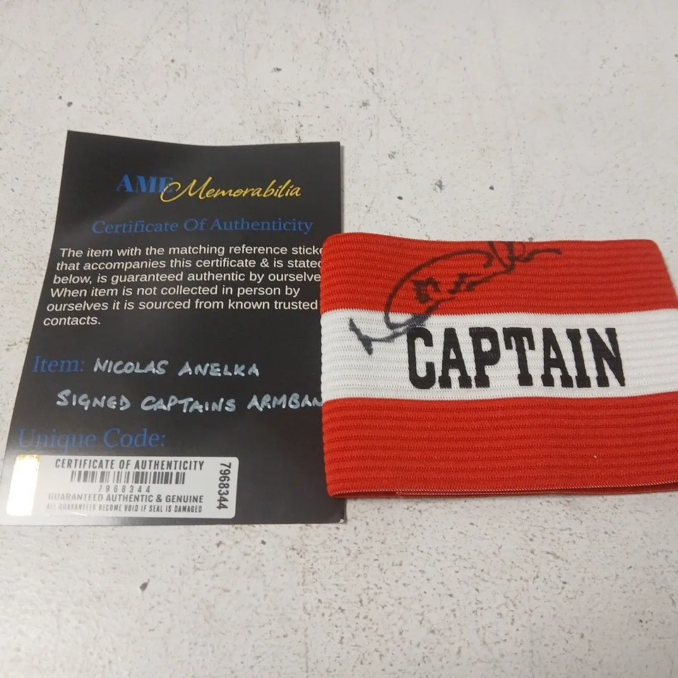 AME MEMORABILIA NICOLAS ANELKA SIGNED CAPTAINS ARMBAND