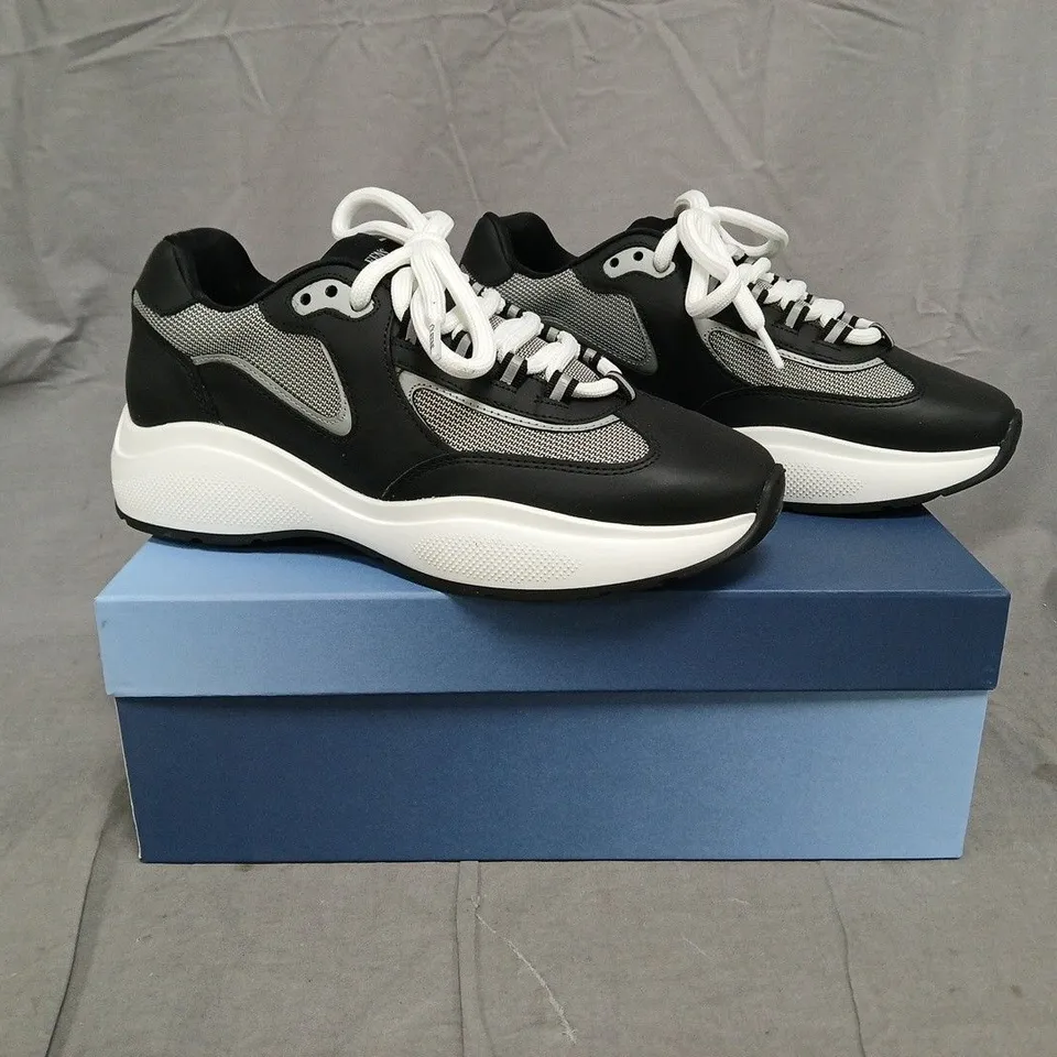 BOXED PAIR OF CLEENS PODIUM TRAINERS IN GRAPHITE SIZE UK 8.5
