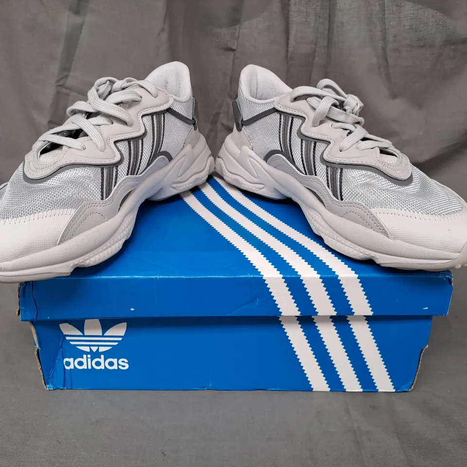 BOXED PAIR OF ADIDAS OZWEEGO SHOES IN GREY UK SIZE 9
