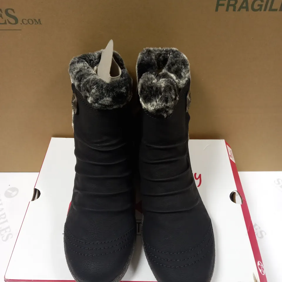 BOXED PAIR OF RIEKER BLACK WEDGE ANKLE BOOTS WITH FAUX FUR TRIM - SIZE 6