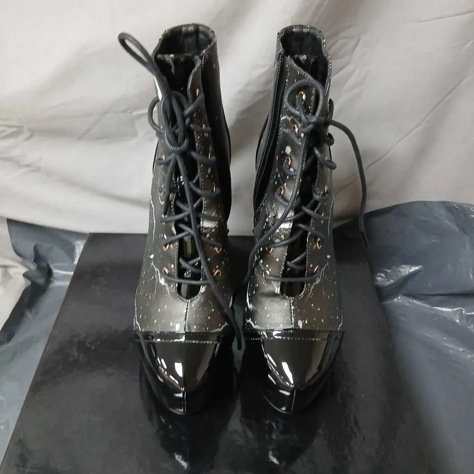 KOI WOMEN'S HIGH HEEL SHORT BOOTS – BLACK PATENT WITH SPLATTER PATTERN (UK4 / EU37)