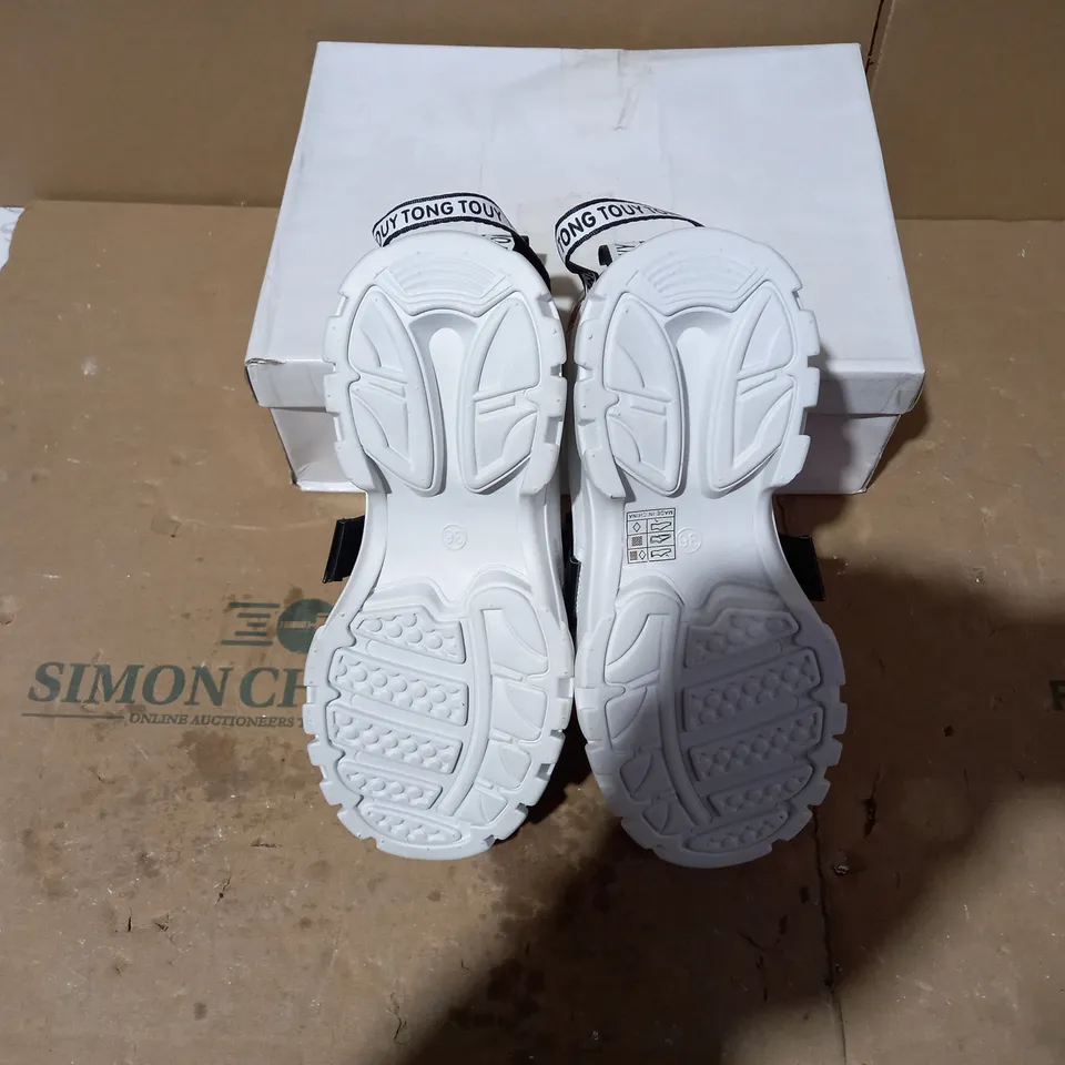BOXED PAIR OF DESIGNER WHITE/BLACK TRAINERS SIZE 36