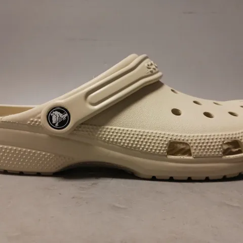 PAIR OF CROCS CLOGS IN BONE UK SIZE 7