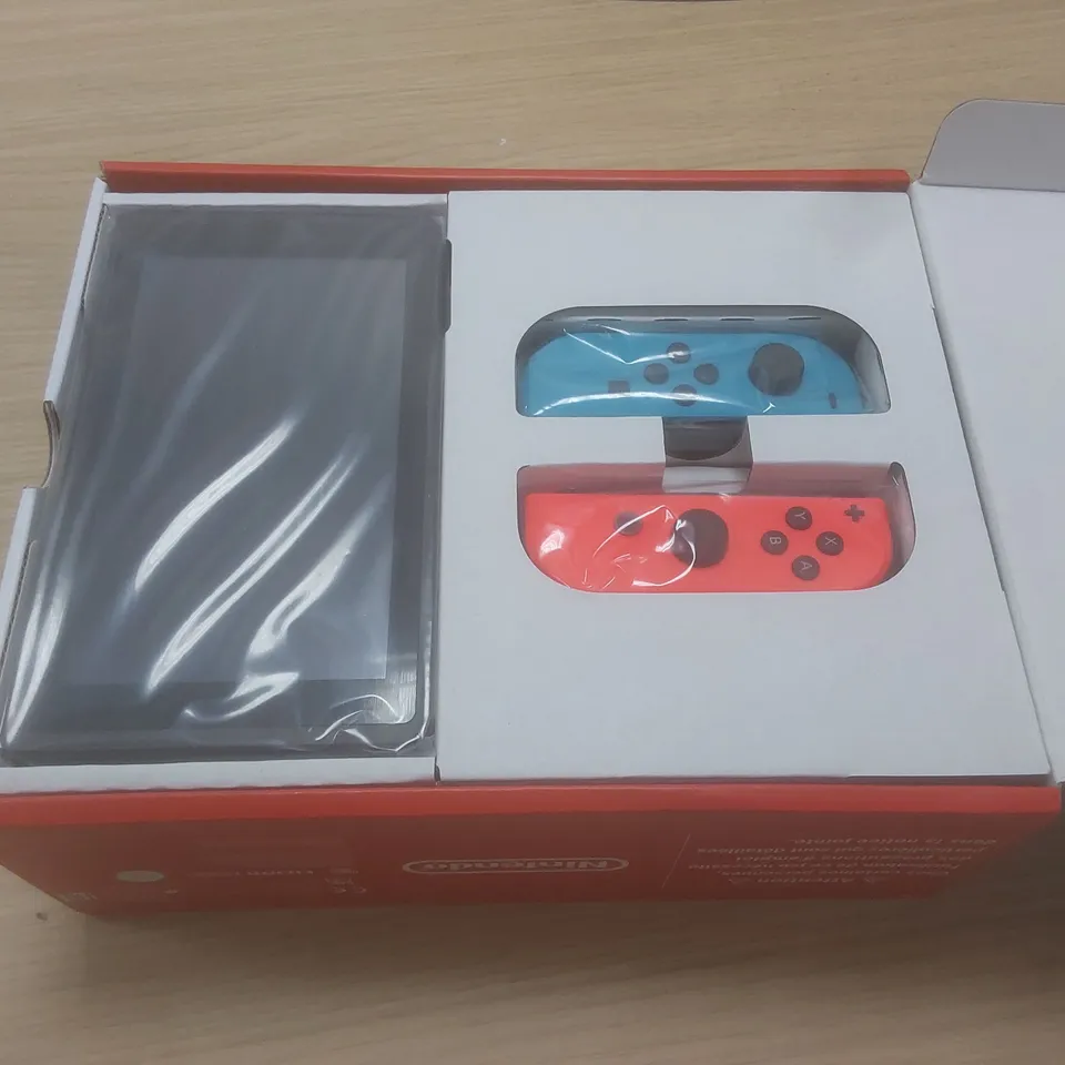 BOXED NINTENDO SWITCH 32GB - NEON RED & BLUE CONTROLLERS