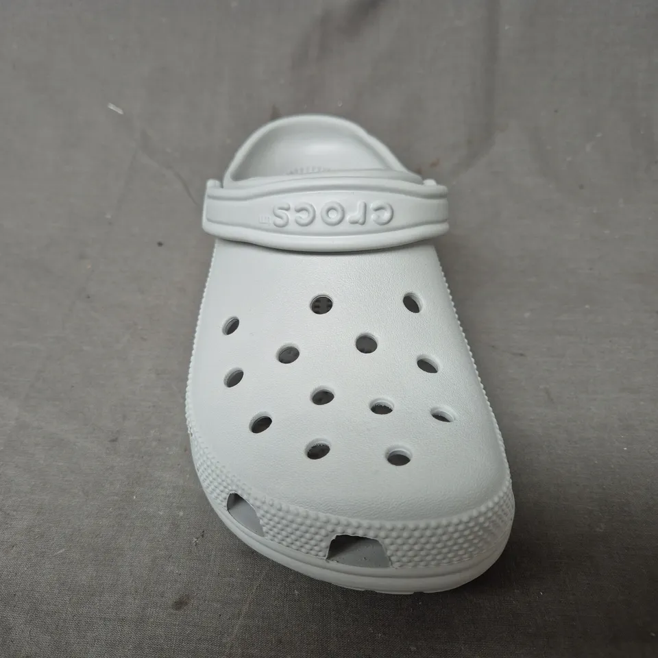 PAIR OF CROCS CLASSIC CLOGS IN GREY UK SIZE M5/W6