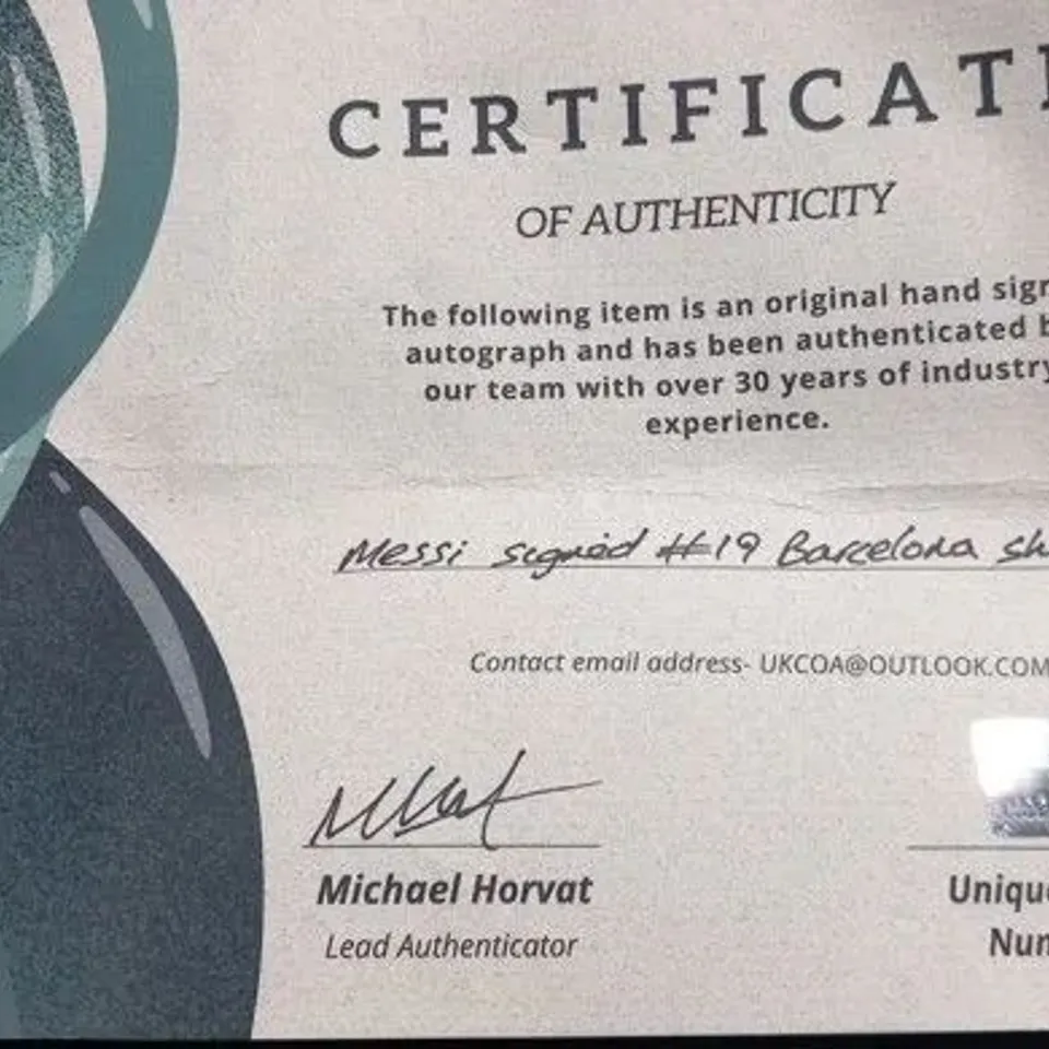 BARCELONA FC HOME JERSEY SIGNED BY LIONEL MESSI WITH CERTIFICATE OF AUTHENTICITY
