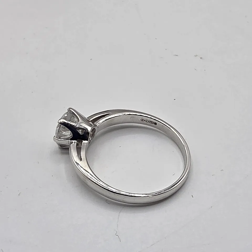 18CT WHITE GOLD SOLITAIRE RING SET WITH A NATURAL DIAMOND WEIGHING +-1.23CT