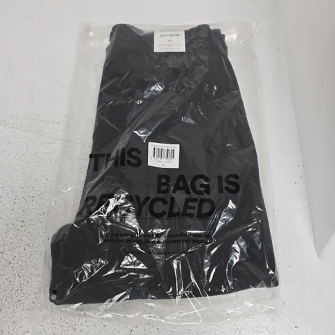 APPROXIMATELY 7 BAGGED BAGGY CUFFED TRACK PANTS IN BLACK - XS