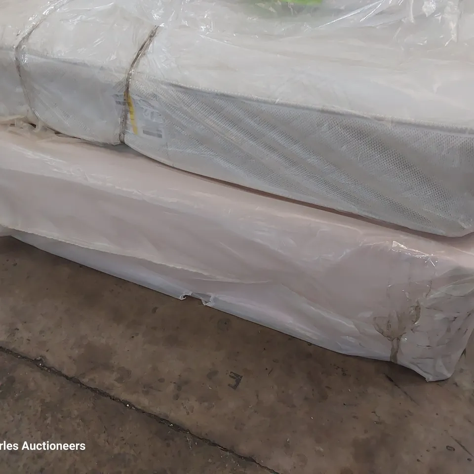 QUALITY BAGGED 4'6" DOUBLE DIVAN BED COMPRISING AERIAL ORTHO MATTRESS ON PINK FABRIC BASE