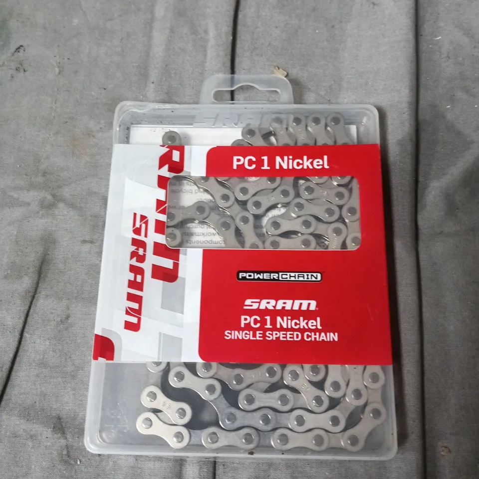 BOX OF ASSORTED AUTOMOTIVE ITEMS INCLUDING SINGLE SPEED CHAIN , KARTING TYRE AND CIGARETTE LIGHTER