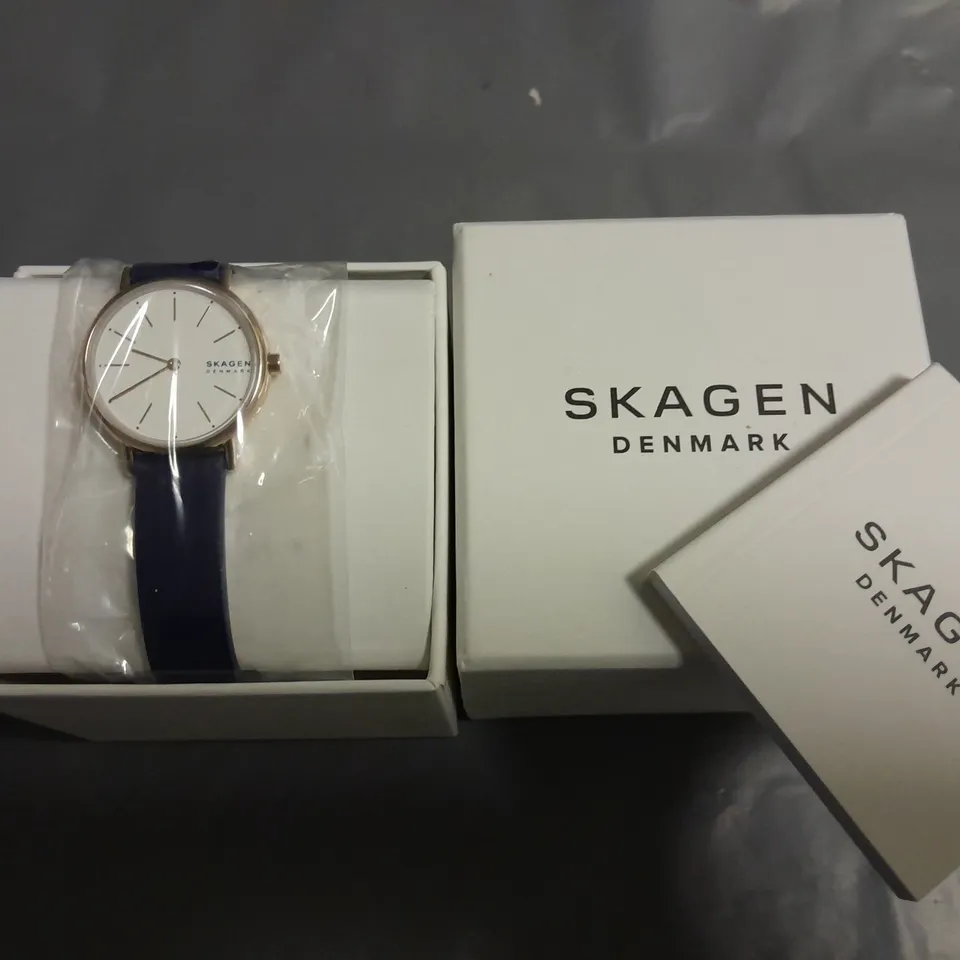 BOXED SKAGEN ALL STAINLESS STEEL LADIES WATCH WITH BLUE LEATHER STRAP