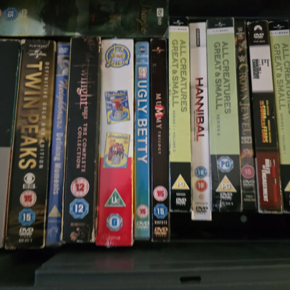 TOTE OF APPROXIMATELY 14 ASSORTED DVD'S TO INCLUDE - THE OC , FRIENDS 6 , THE MAN U.N.C.L.E ETC