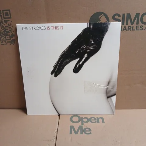 THE STROKES IS THIS IT RED VINYL LP