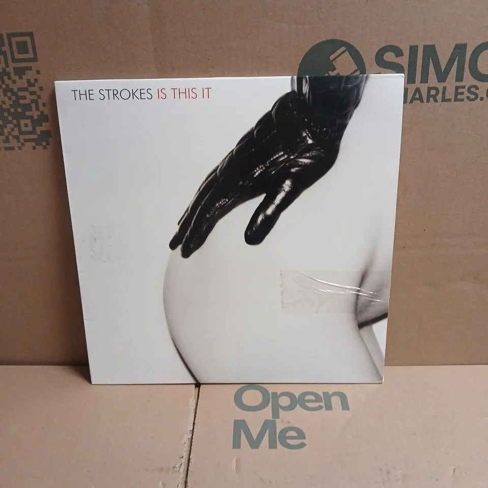 THE STROKES IS THIS IT RED VINYL LP