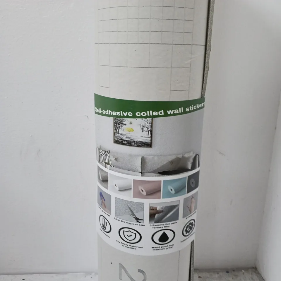 BOX CONTAINING APPROXIMATELY 7 ROLLS OF SELF ADHESIVE COILED WALL STICKERS. SOME NEW SOME ALREADY USED.
