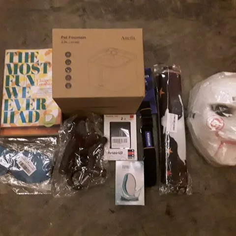 PALLET OF ASSORTED PRODUCTS INCLUDING PET FOUNTAIN, PORTABLE SSD, THE MOST FUN WE EVER HAD BOOK, EYE MASKS, JIGSAW HALLOWEEN MASK, HAIR REMOVAL EXFOliation