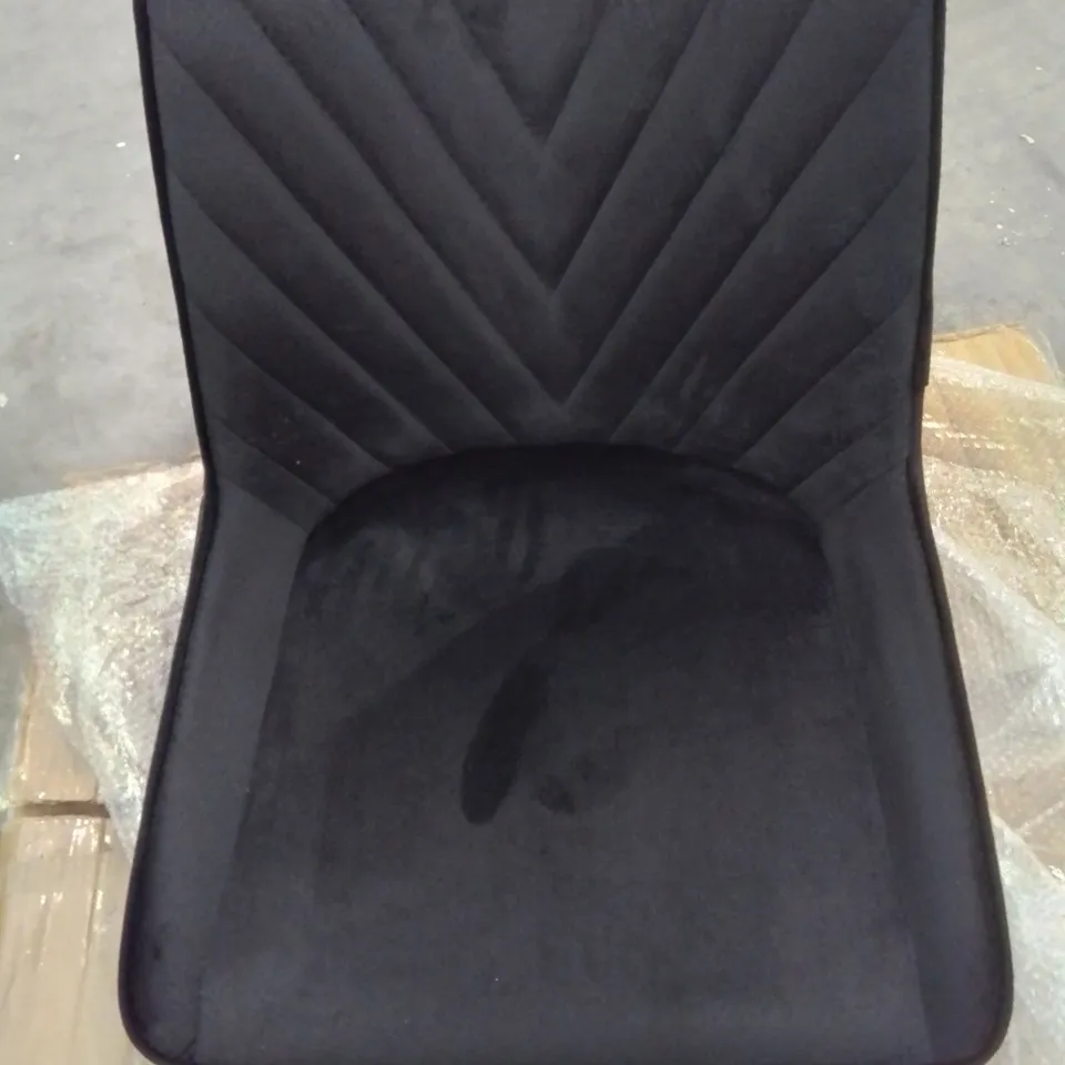 A BOXED PAIR IF BLACK VELVET UPHOLSTERED DINING CHAIRS