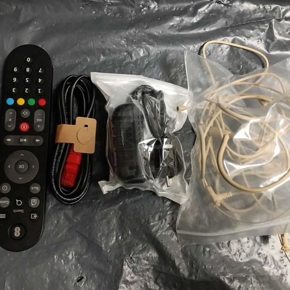 APPROXIMATELY 10 ASSORTED HOUSEHOLD ITEMS TO INCLUDE VARIOUS CABLES AND REMOTES, ETC