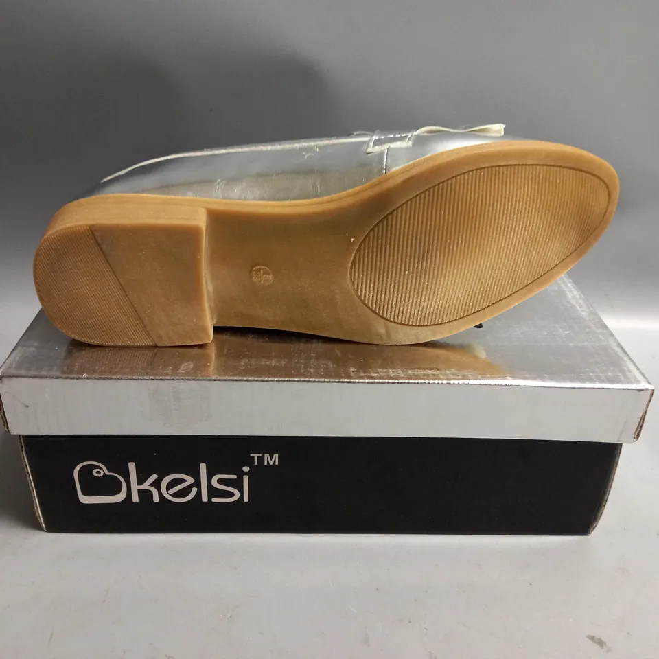 BOXED KELSI LADIES FLAT SILVER BROGUES. SIZE 5