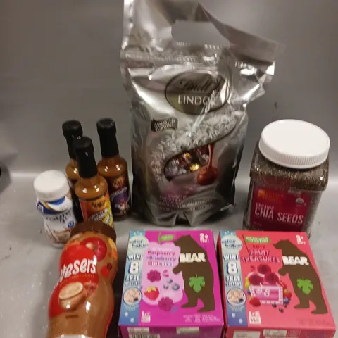 APPROXIMATELY 10 ASSORTED FOOD PRODUCTS TO INCLUDE ORGANIC CHIA SEEDS, MALTESERS MALT DRINK, LINDOR CHOCOLATES ETC