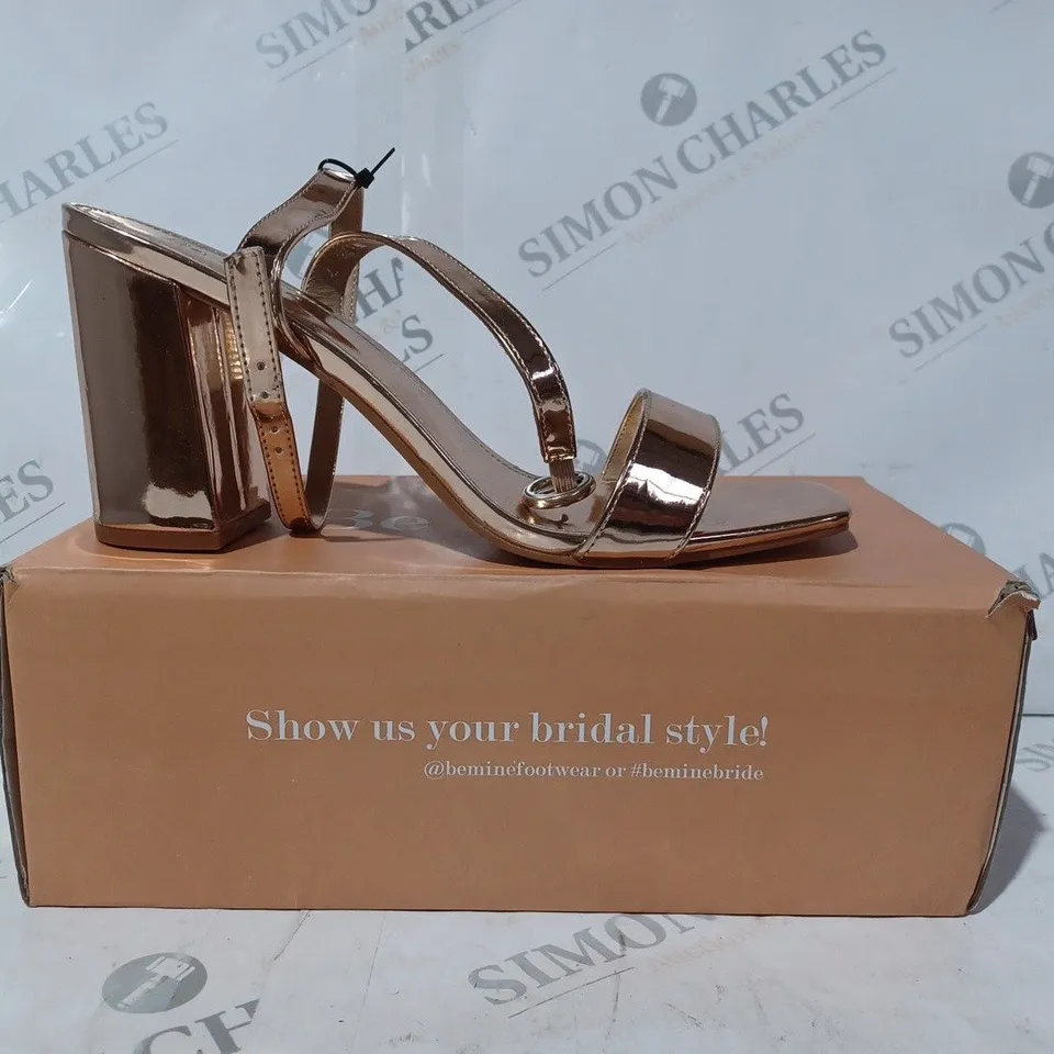 BOXED PAIR OF BE MINE BRIDAL WINK HEELED SANDALS IN METALLIC ROSE GOLD COLOUR SIZE 7