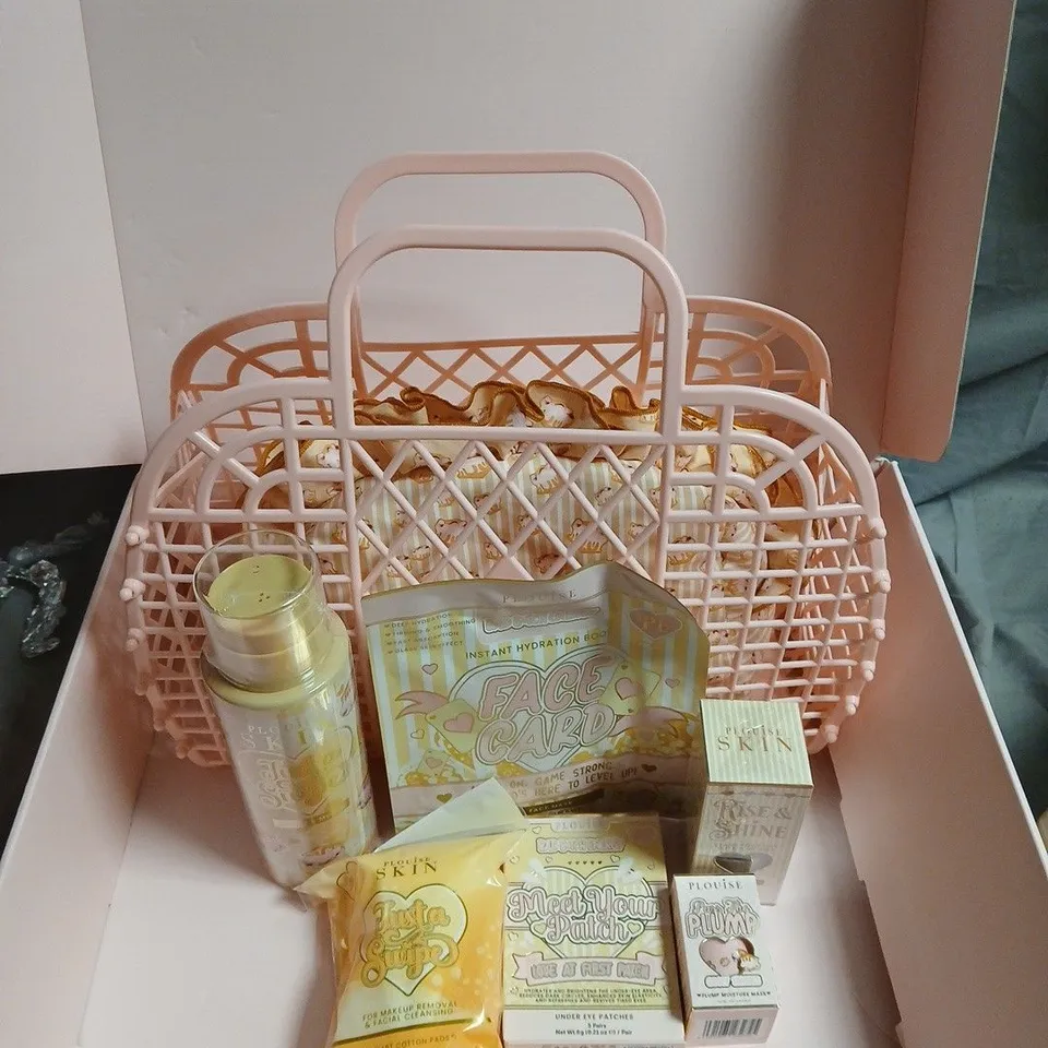 PLOUISE SKINCARE GIFT SET TO INCLUDE A FACE MASK, SERUM AND MICELLAR WATER IN A COSMETICS BAG AND PINK BASKET