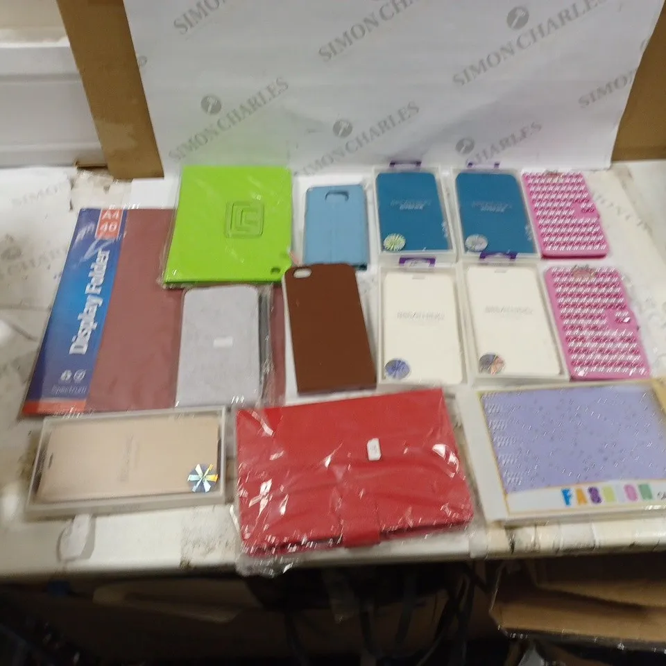 LOT OF TEN CASES FOR DIFFERENT PHONES WITH VARIED COLOURS AND SIZES 