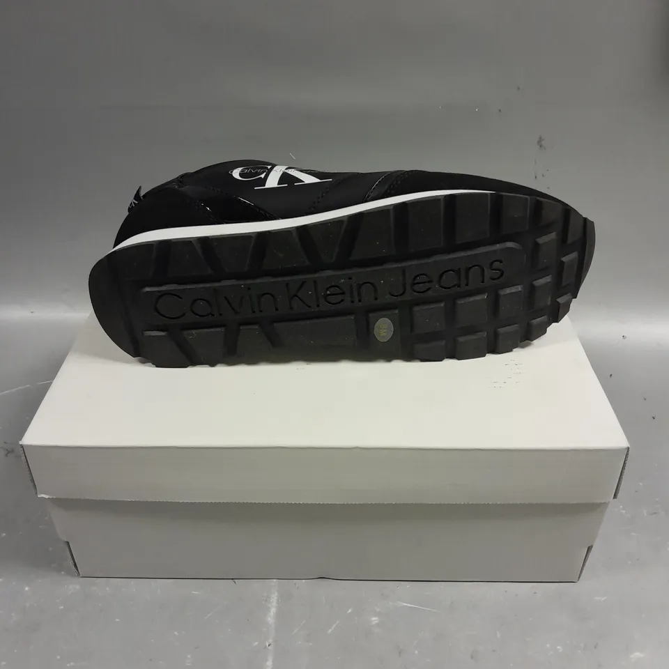 BOXED PAIR OF CALVIN KLEIN CAYLE BLACK FABRIC TRAINERS - 8