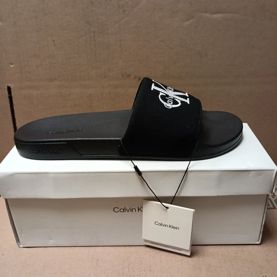 CALVIN KLEIN TRIPLE BLACK SLIDE SANDALS – MEN’S UK 9 (EU 43)