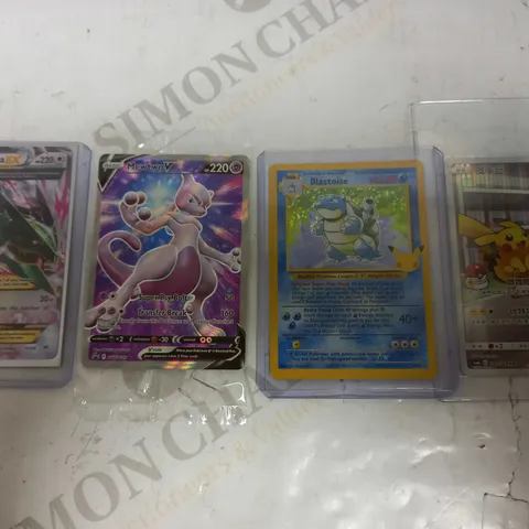 LOT OF 4 POKEMON CARDS