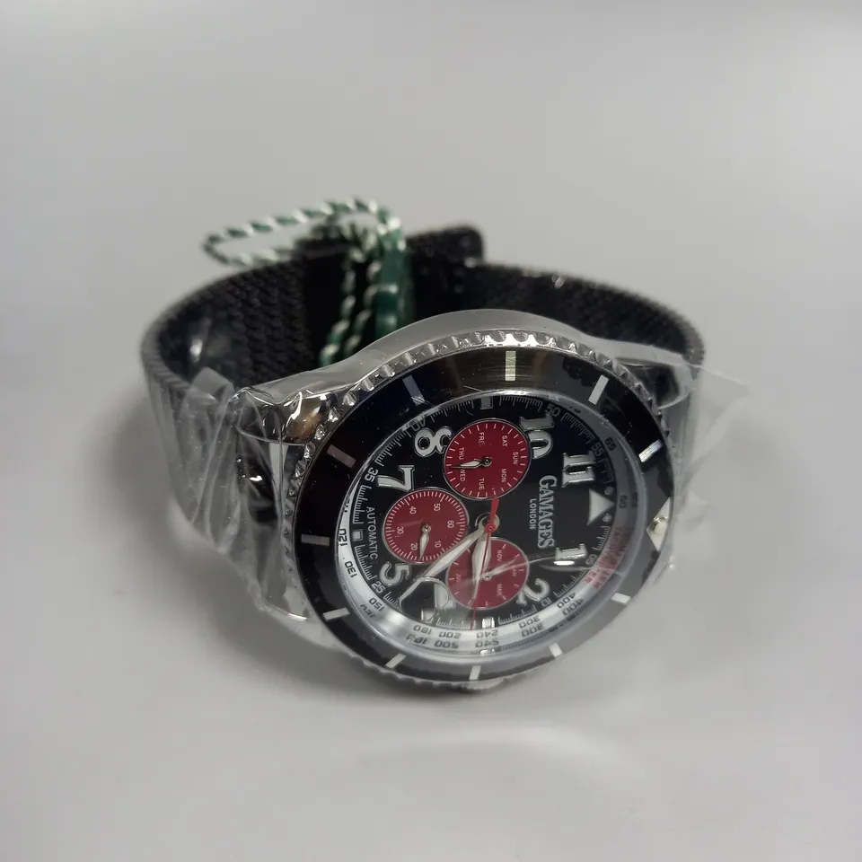 BOXED GAMAGES CONTEMPORARY SPORTS STEEL BLACK DIAL WATCH 